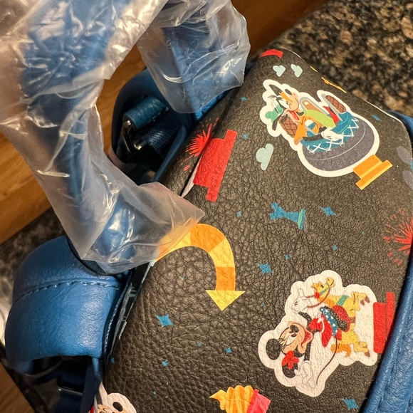 Loungefly Disney Parks Disneyland Ride all over Icon Mini Backpack NWT - Picture 3 of 8